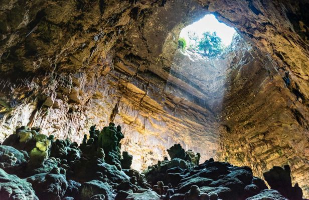 Castellana Caves guided tour and free time in Polignano a Mare from Bari