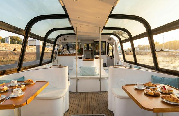 Private sunrise cruise with coffee and pastries in Lisbon