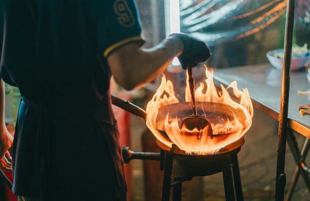 Evening street food tour by tuk-tuk in Bangkok's Chinatown