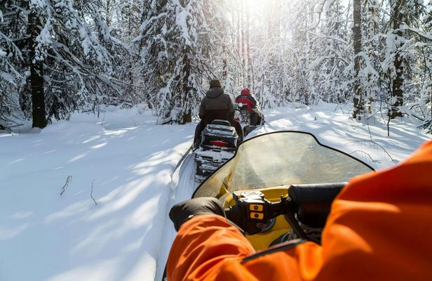 Snowmobile or quad ride and thermal pools day trip from Zakopane