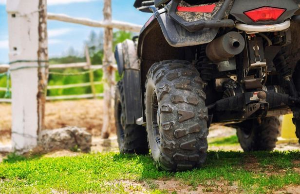 Snowmobile or quad ride and thermal pools day trip from Kraków