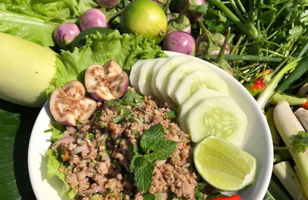 Lao cooking class on a Mekong River boat with market visit