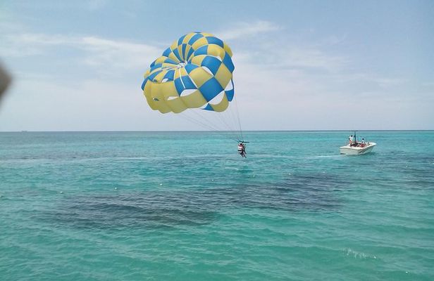 Parasailing Snorkeling and Glass Boat Adventure in Negril