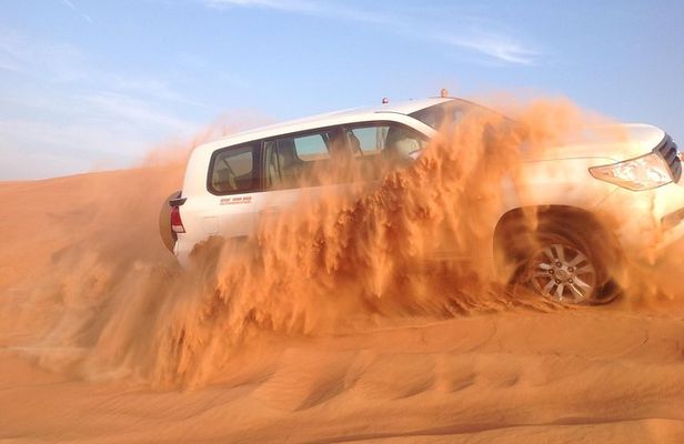 Best Dubai Desert Safari-Dune Bashing & Camel Riding with BBQ & Belly Dance Show