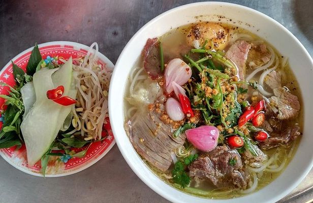 Cooking class, market tour and basket boat tour