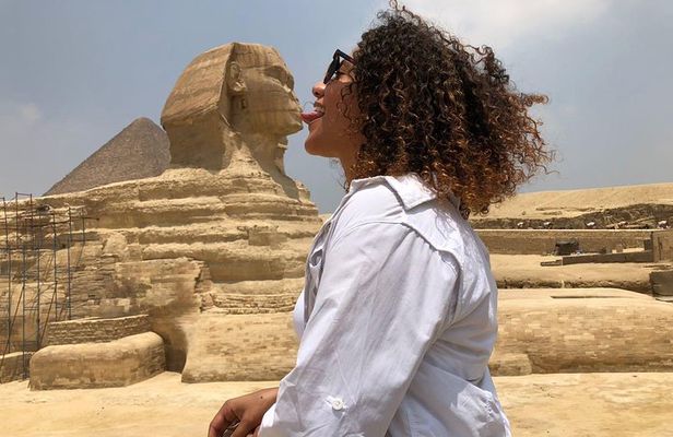 Day Tour to Giza pyramids sphinx Egyptian museum bazaar camel ride Nile cruise