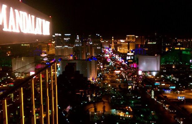 2-Hour Vegas Strip Walking Tour with Photos,Champagne & Vintage Vegas Goody Bags