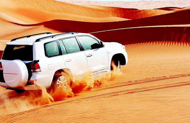 Red Dunes Safari with Sandboarding & Camel Ride from Ras Al Khayma