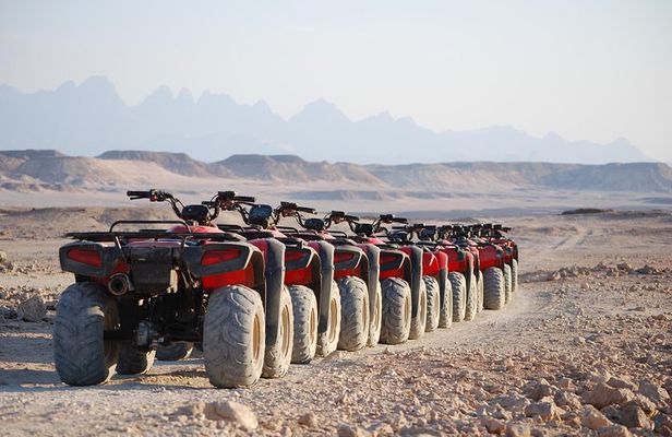 El Gouna Sunset Safari tour by Quad bike, Through The Dry Canyon, and Sand Dunes