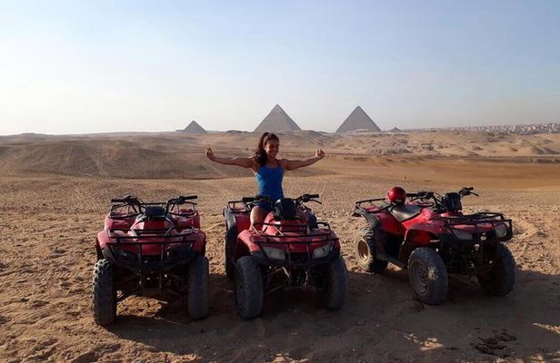 Quad Bike Trip during sunset around Pyramids, evening attend the sound & light show at Giza Pyramids with Dinner