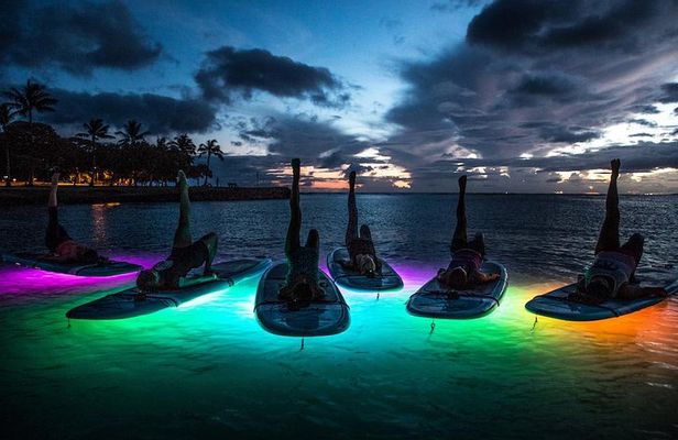 Night SUP Yoga in Honolulu, Hawaii