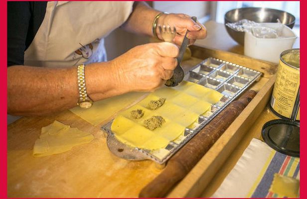 Dining experience at a local's home in Porto Cesareo with cooking demo