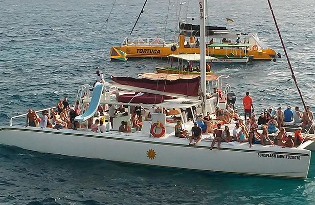 Negril seven Miles Beach| Rick's Café Sun Set | with Open Bar Catamaran is fun: