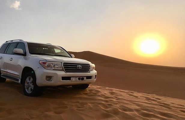 Sunset Desert Safari With BBQ Dinner, Camel Ride, Belly Dancing from Dubai