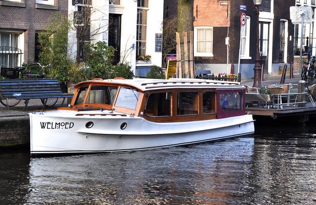 Private Guided Historic Amsterdam Canal Cruise in a Salon Boat