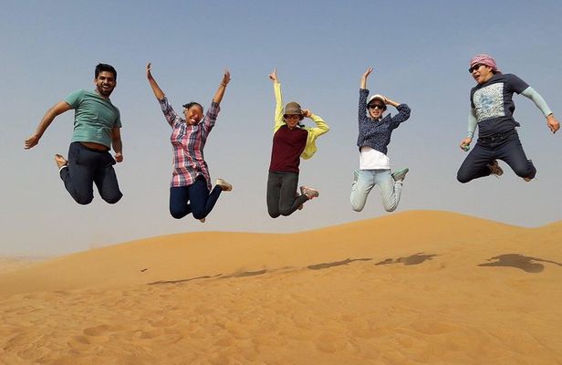 Sunrise View Desert Safari with Camel Ride & Sand Boarding 