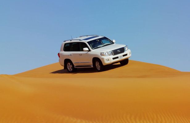 Dubai Red Dune Safari with BBQ Dinner & Live Shows from RAK