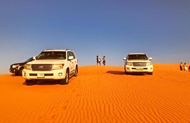 Morning Desert Safari with Camel Ride & Sand Boarding