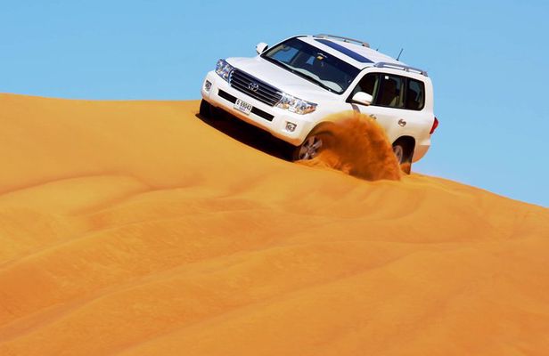 Dubai Dune Bashing Safari With BBQ Dinner, Entertainment and Camel Ride
