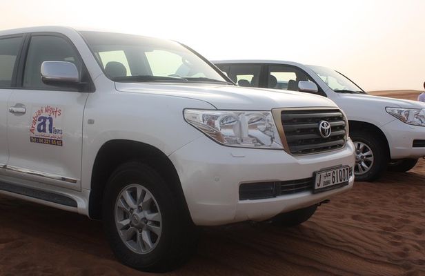 Morning Desert Safari: Dune Bashing, Sand boarding & Camel Ride