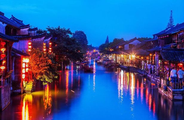 Xitang Water Village Sunset Tour with Riverside Dining Experience from Shanghai