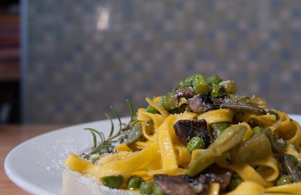 Dine & Enjoy a Cooking Demo at Local's Home in Pisa