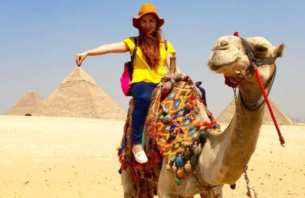 Half day Guided tour to Giza pyramids Sphinx with 1 Hour Camel ride