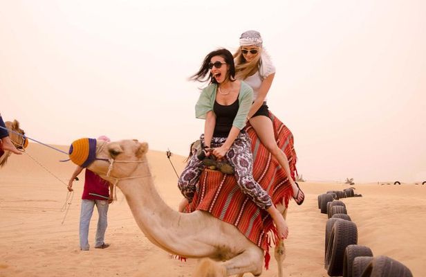 Camel Ride in Desert with Dune Bashing, BBQ Dinner and Belly Dance