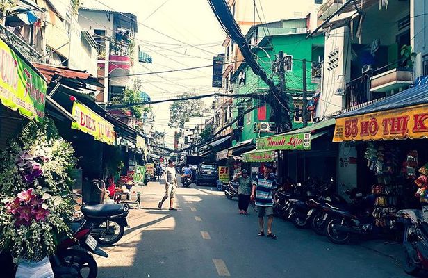 Morning Saigon Unseen+Street Food Tour with Ao Dai Riders Option