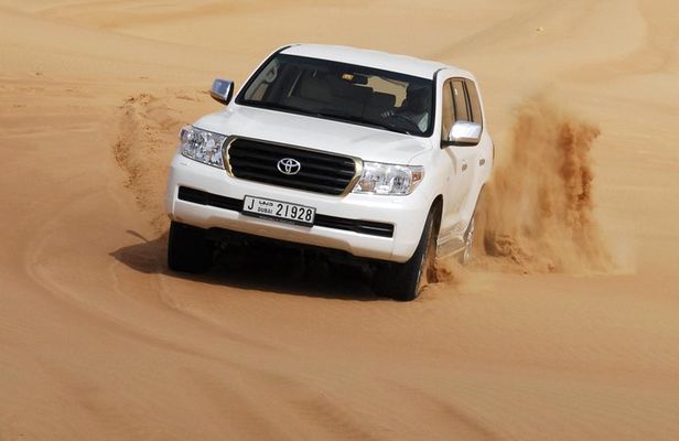Premium Red Dune Desert Safari,BBQ dinner, camel ride, live show at Majilis camp
