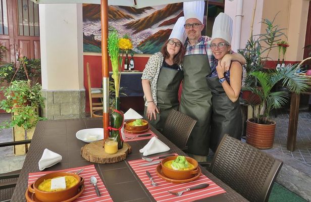 Cooking Class with a chef and local market including hotel pickup