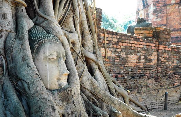 Explore the ancient capital of Ayutthaya by tuk-tuk
