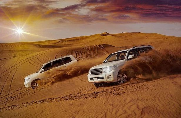Evening Desert Safari with Camel Ride, BBQ Dinner and Dune Bashing