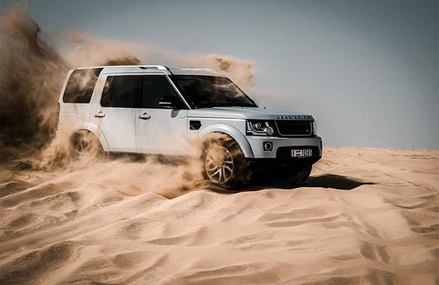 Desert Safari with Dune Bashing, Camel Ride & BBQ Dinner