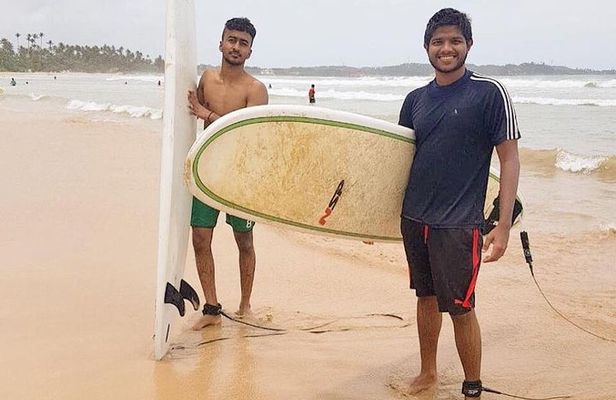 Surfing in Unawatuna