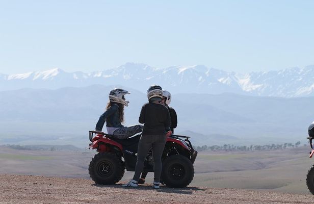 Half-day quad bike in the palmgrove & rock desert