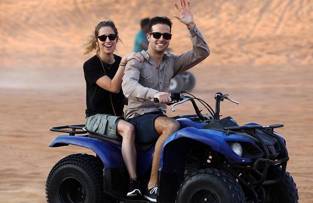 Red Dunes by Quad Bike with VIP Camp, Camels, Sandboarding & Falcon