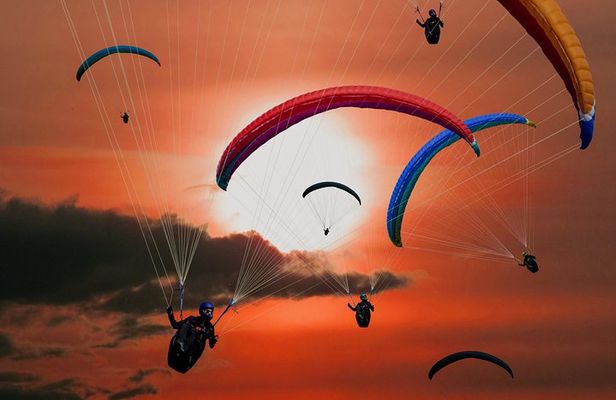 Paragliding in Marrakech Agafay Desert Sunset.