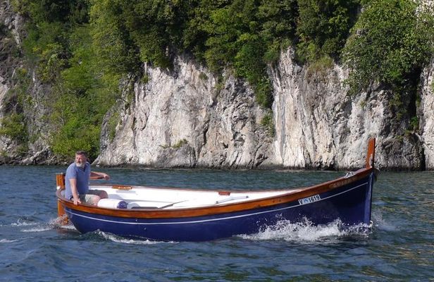 Slow boat tour for small groups with appetizer on Lake Maggiore