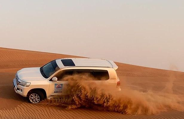 Private Evening Desert Safari with BBQ Dinner & Sand Boarding