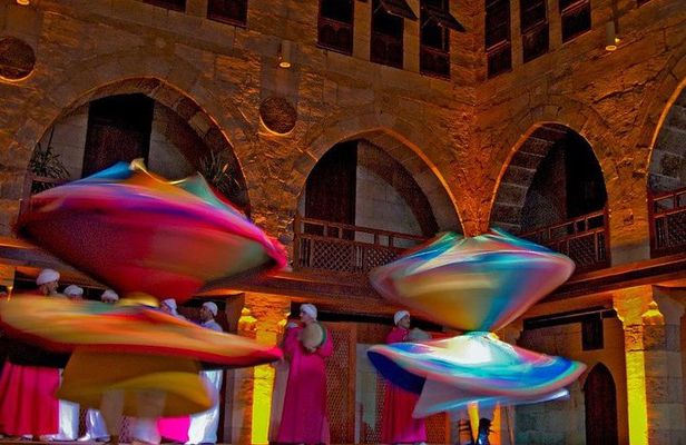 Cairo by night including Tanoura Show at Wikalet Al Ghouri Khan El Khalili Tahrir Square