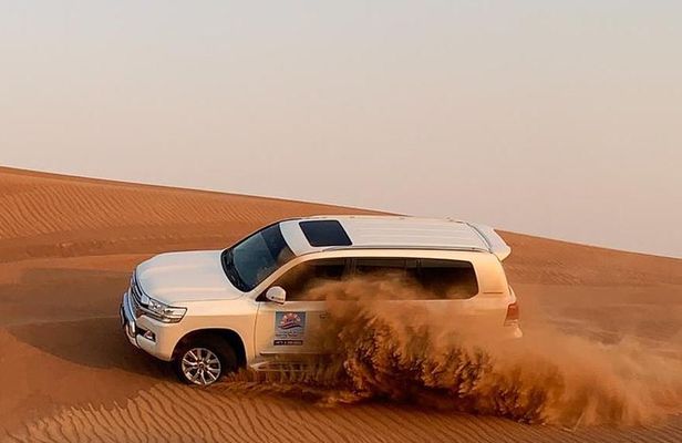 Dubai Morning Desert Safari: Camel Ride & Sandboarding!