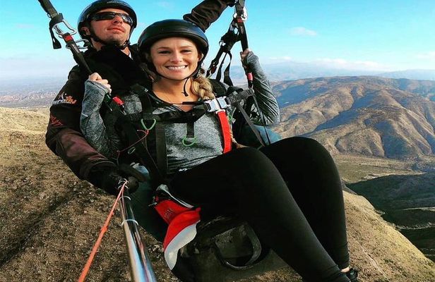 Paragliding free flight experience over the pre-range