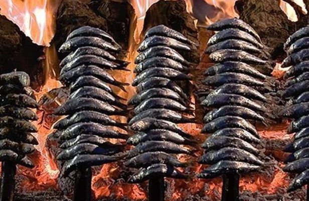 Sardines On Skewers Show Cooking in Malaga beach