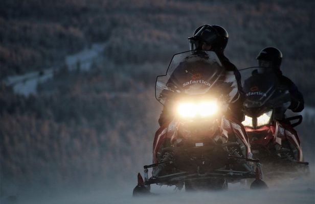 Evening Escape - Snowmobile safari and campfire in Rovaniemi