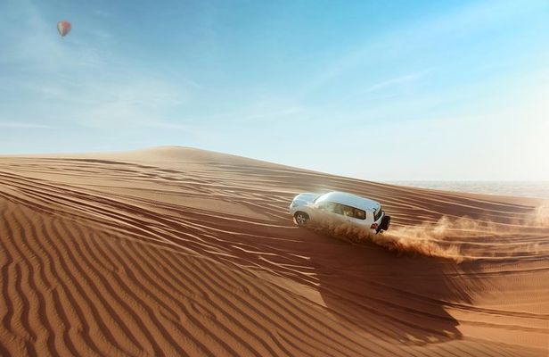 Desert Safari Dubai with Dune Bashing, Sandboarding, Camel Ride, 5 Shows, Dinner