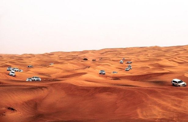 Dubai Desert Safari Red Dune: BBQ, Camel Ride & Sandboarding