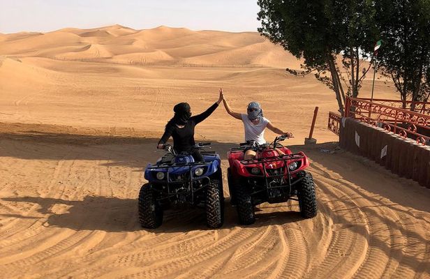 Dubai: Unique SUNSET Quad Bike Red Dunes Safari