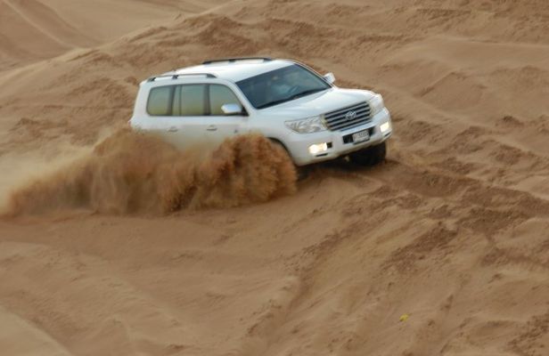 Morning Red Dunes Desert Safari With Camel Ride And Sand Boarding