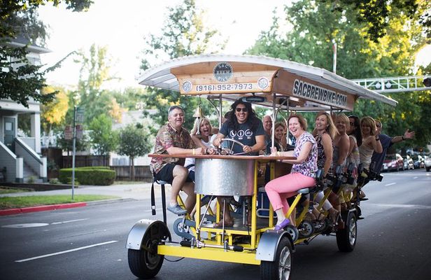 Pedal, Drink, and Bar hop through Sacramento on a 15 seat Beer Bike